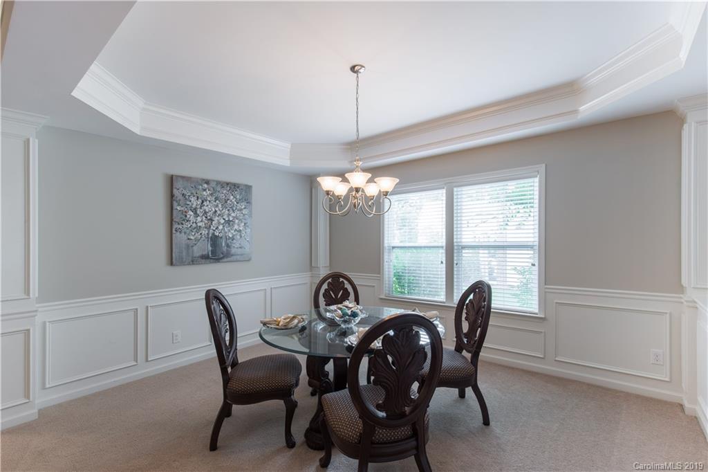 3347 Mandrake Court Tega Cay, SC 29708 - Photo 7 of 27 a dining room with furniture a chandelier and window