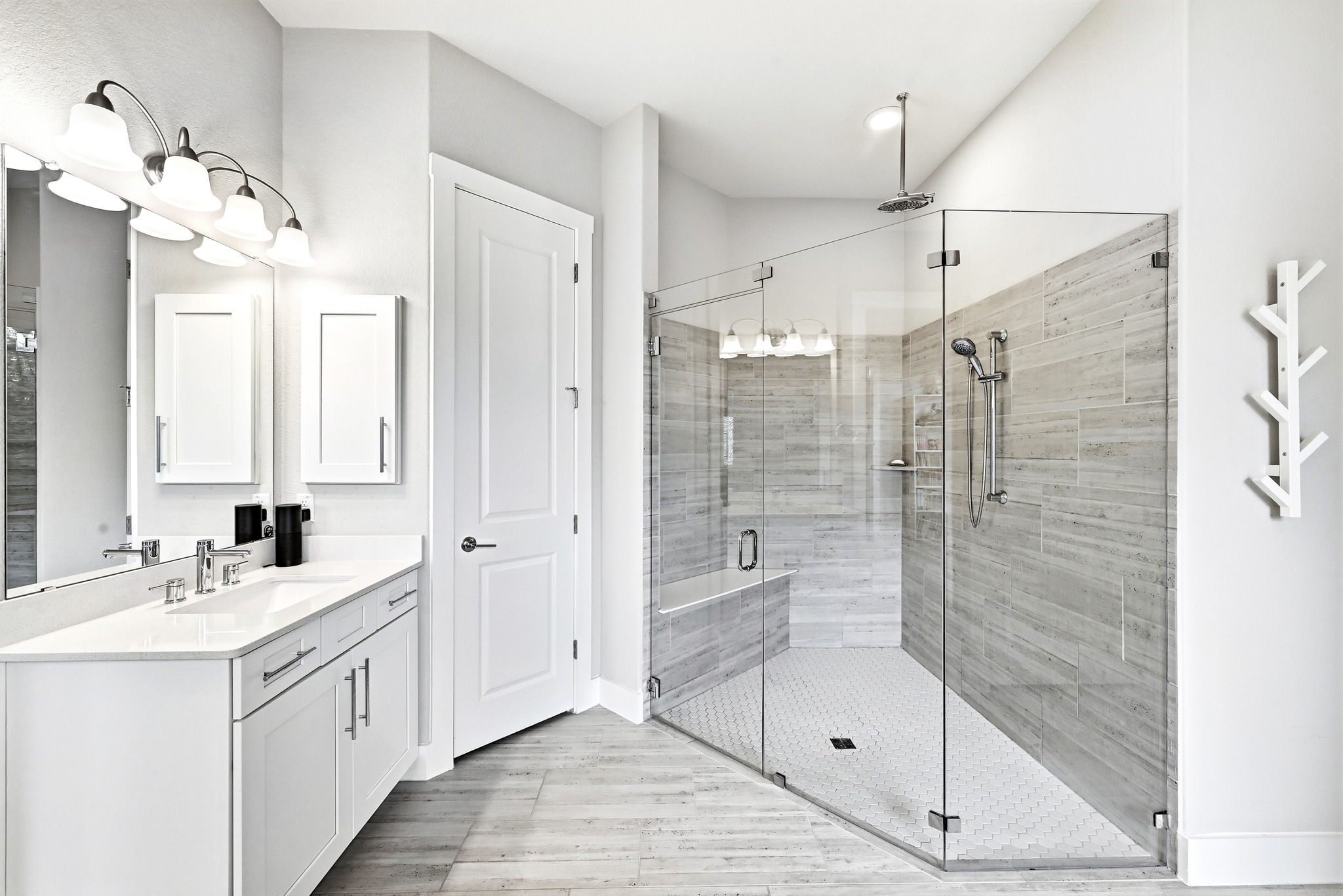 9008 Harper Rae Drive Austin, TX 78717 - Photo 22 of 39 Expansive walk-in shower with glass enclosure, built-in bench, and dual shower heads