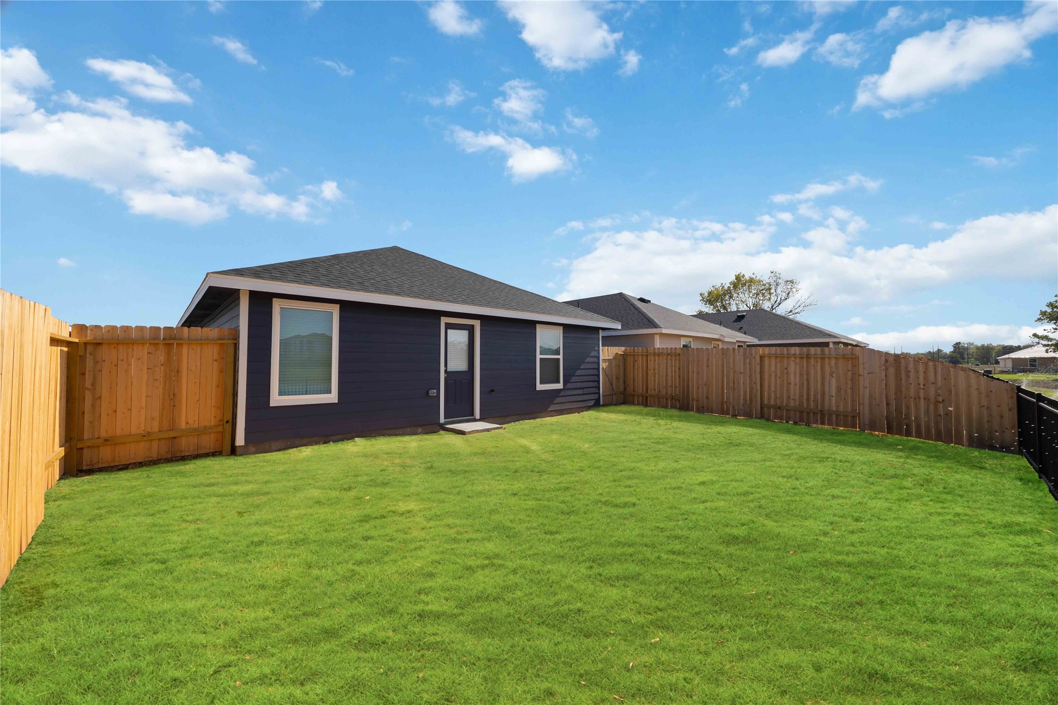 11913 Sweet Apple Lane Houston, TX 77048 - Photo 20 of 20 a view of a house with a yard