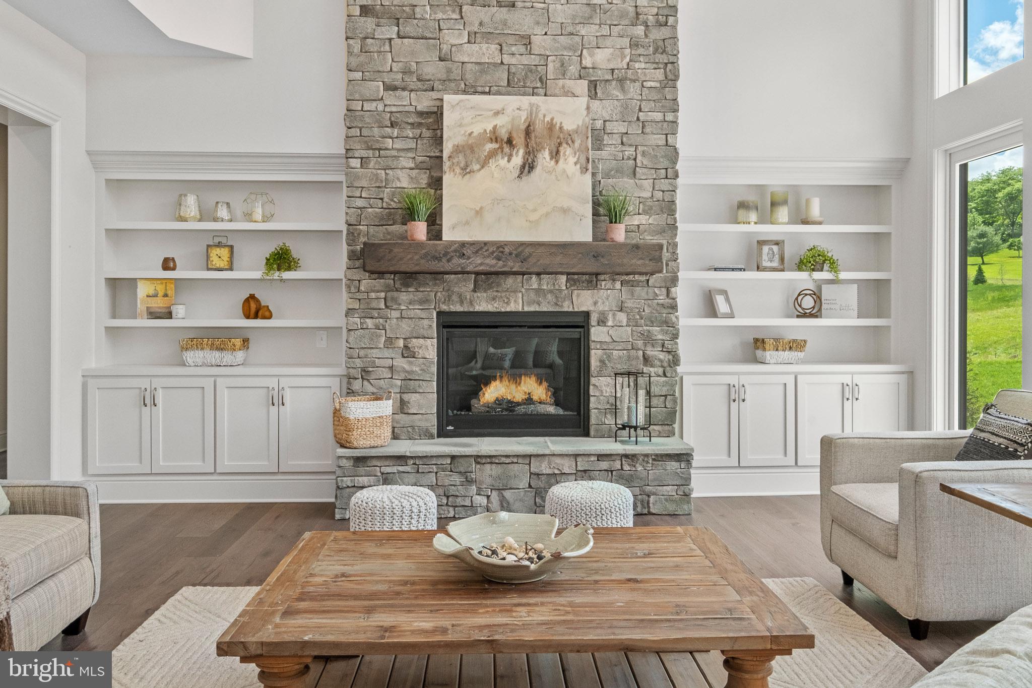 547 Webb Road Chadds Ford, PA 19317 - Photo 13 of 63 a living room with furniture and a fireplace