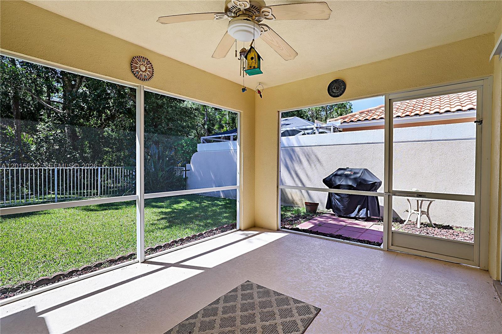 774 Southwest Balmoral Trace Stuart, FL 34997 - Photo 2 of 35 Screened in patio with peaceful private preserve view