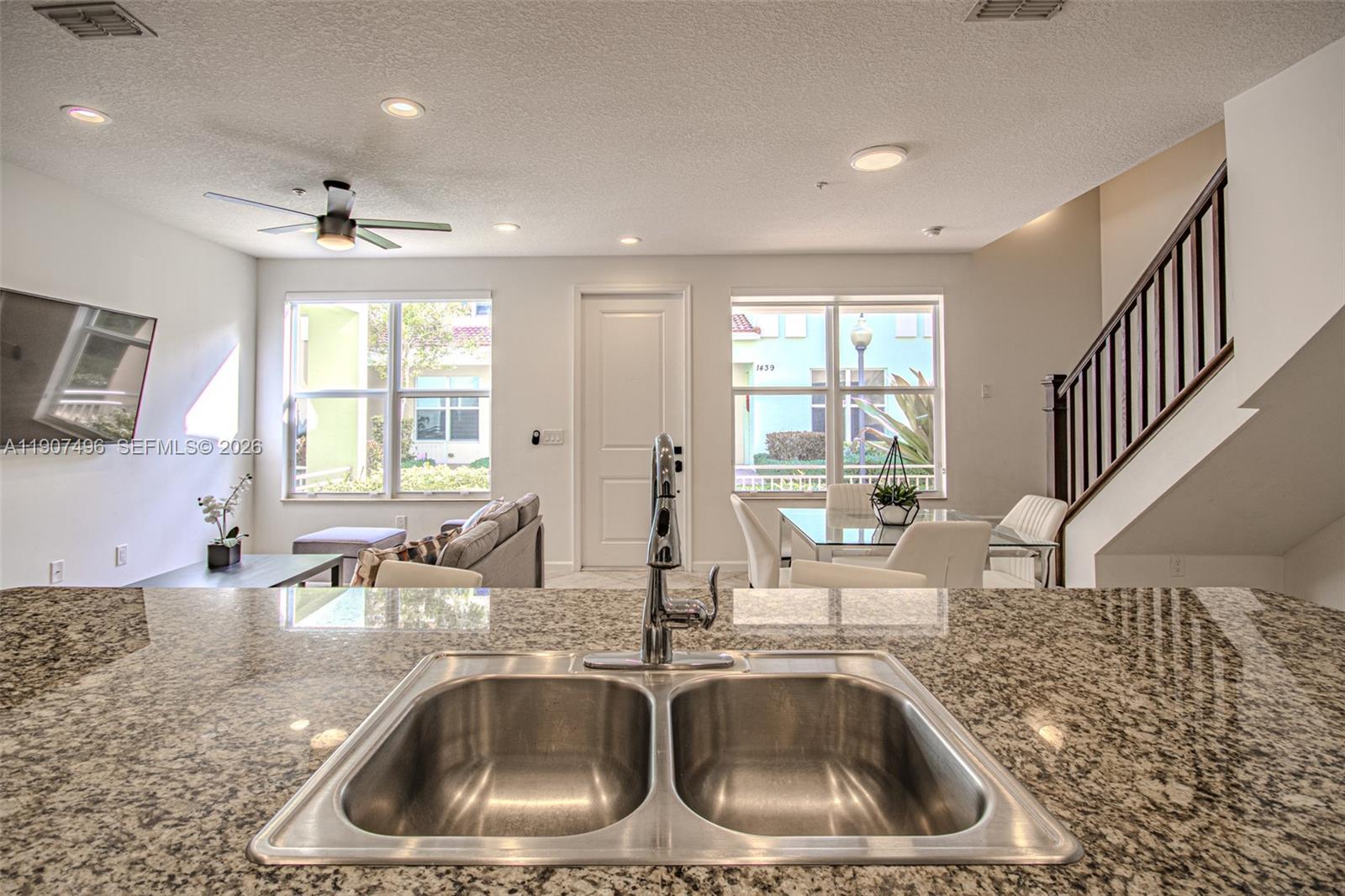 1430 Northwest 48th Drive Boca Raton, FL 33431 - Photo 12 of 33 a kitchen with a sink and a window