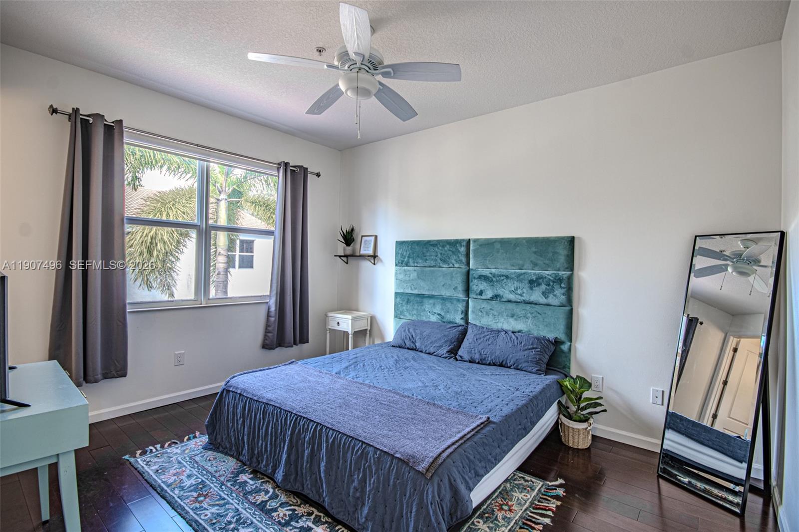 1430 Northwest 48th Drive Boca Raton, FL 33431 - Photo 19 of 33 a bedroom with a bed next to a window with outer space