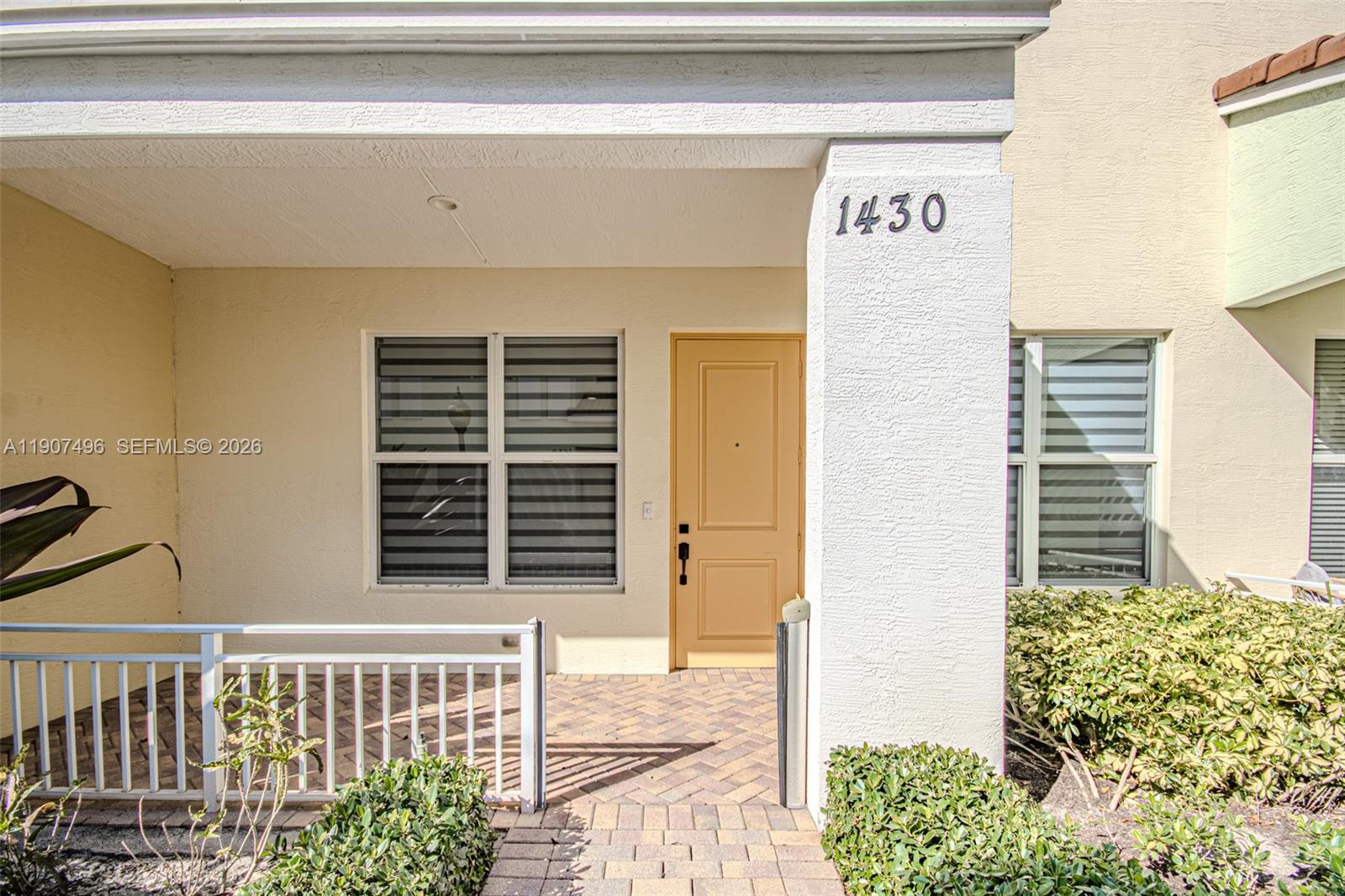 1430 Northwest 48th Drive Boca Raton, FL 33431 - Photo 2 of 33 a view of porch with a small yard