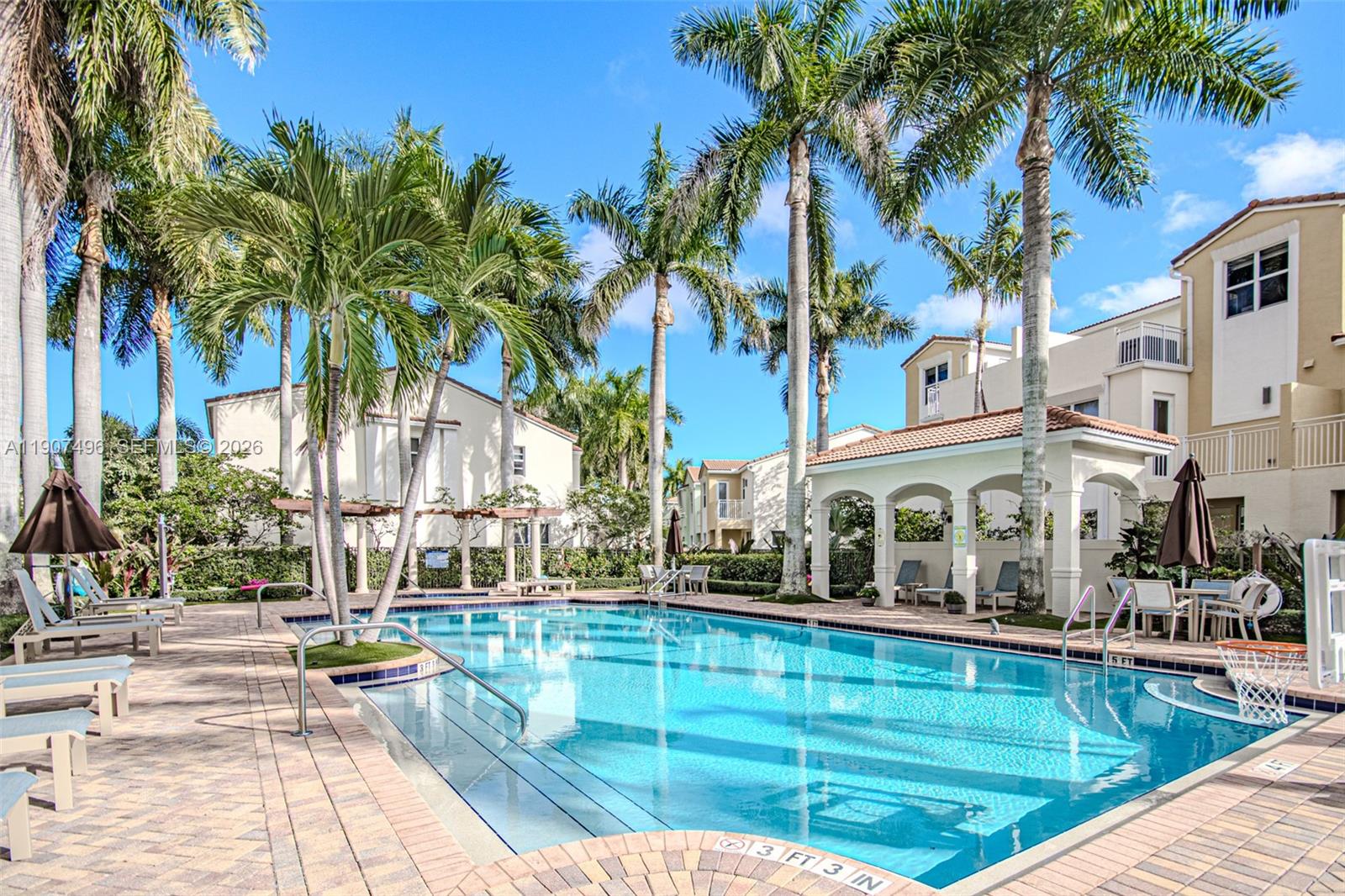 1430 Northwest 48th Drive Boca Raton, FL 33431 - Photo 24 of 33 a swimming pool with outdoor seating and yard