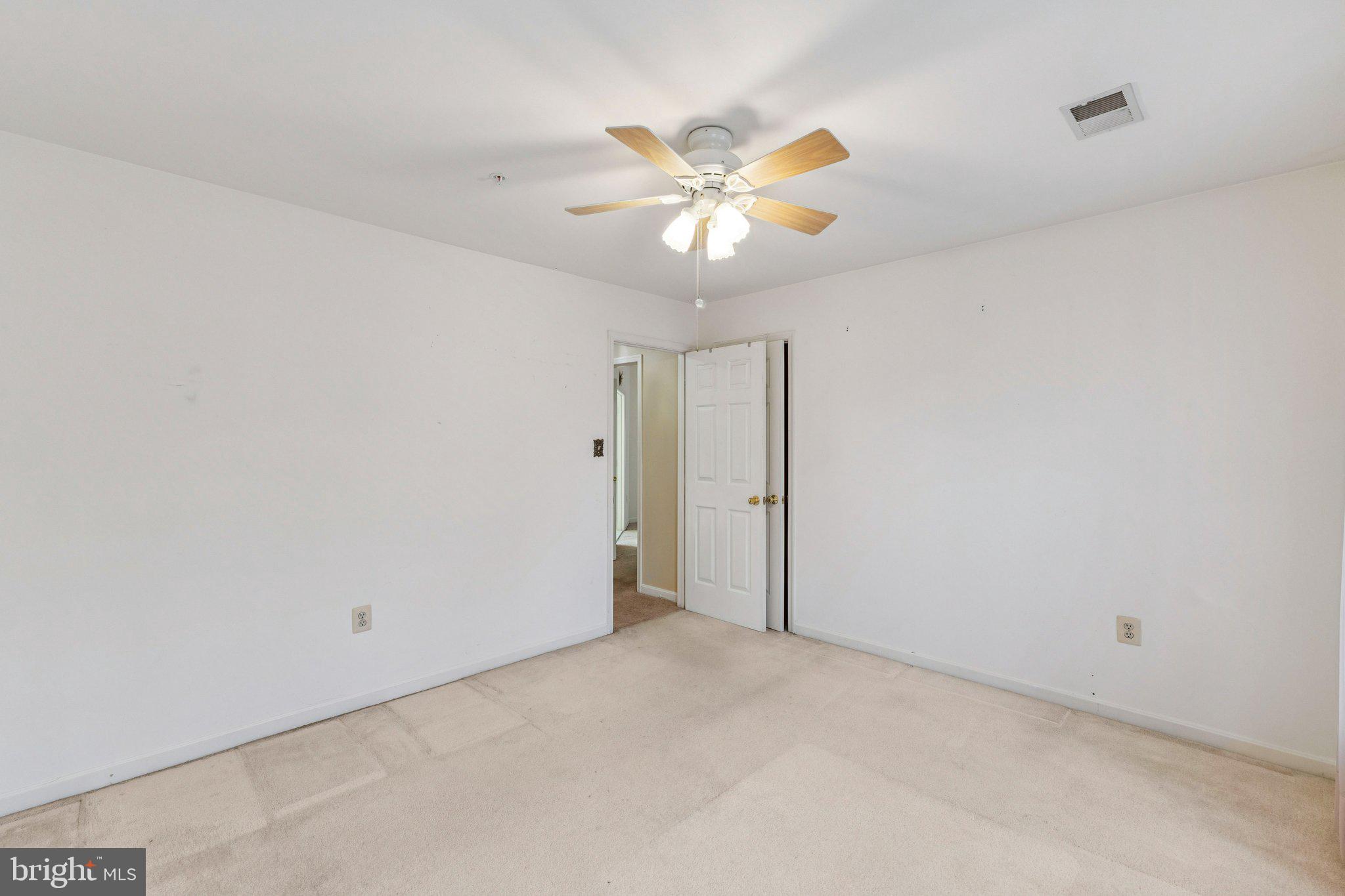 12205 Quick Fox Lane Bowie, MD 20720 - Photo 29 of 39 a view of an empty room