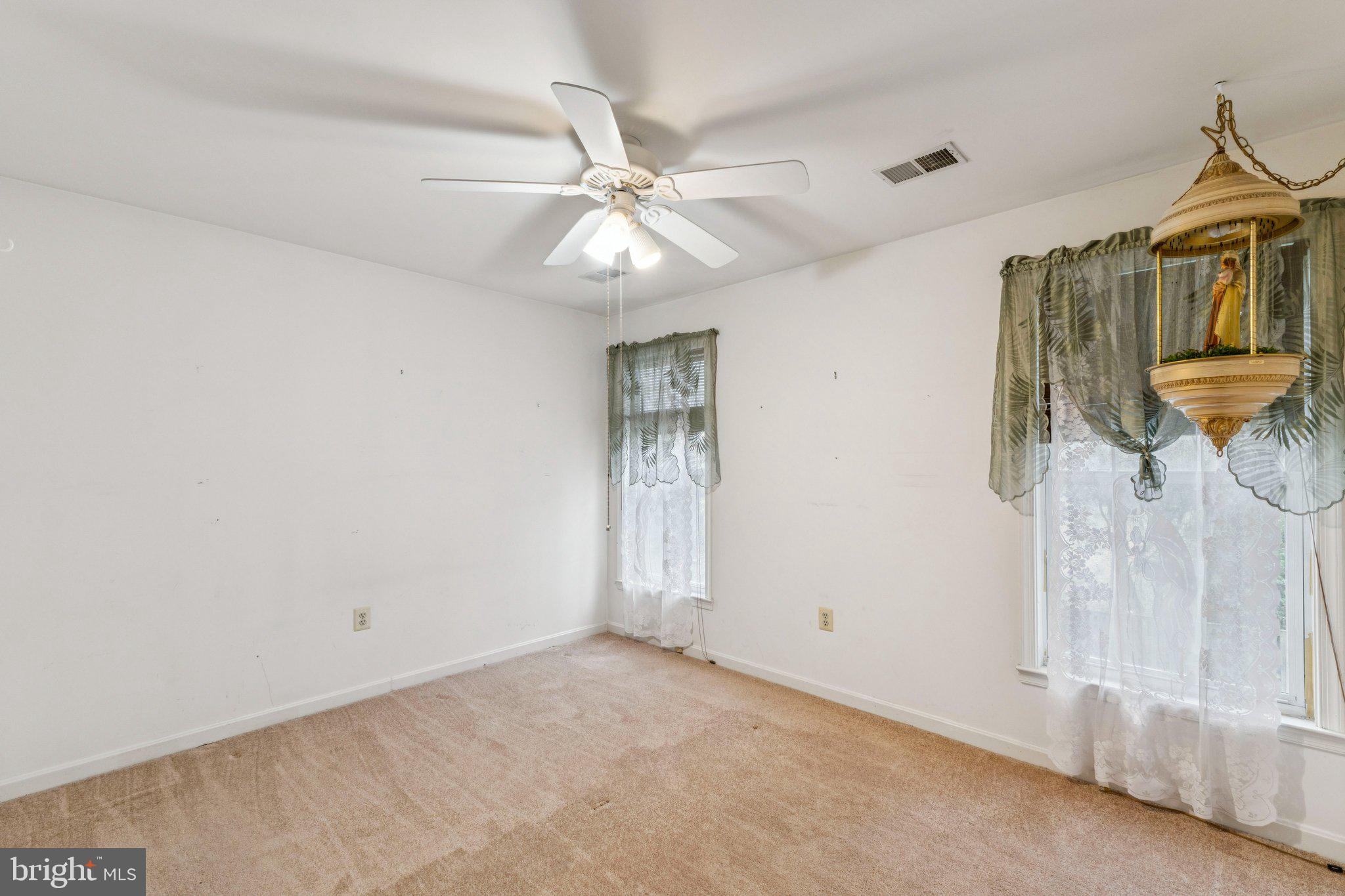 12205 Quick Fox Lane Bowie, MD 20720 - Photo 32 of 39 a view of an empty room with a window