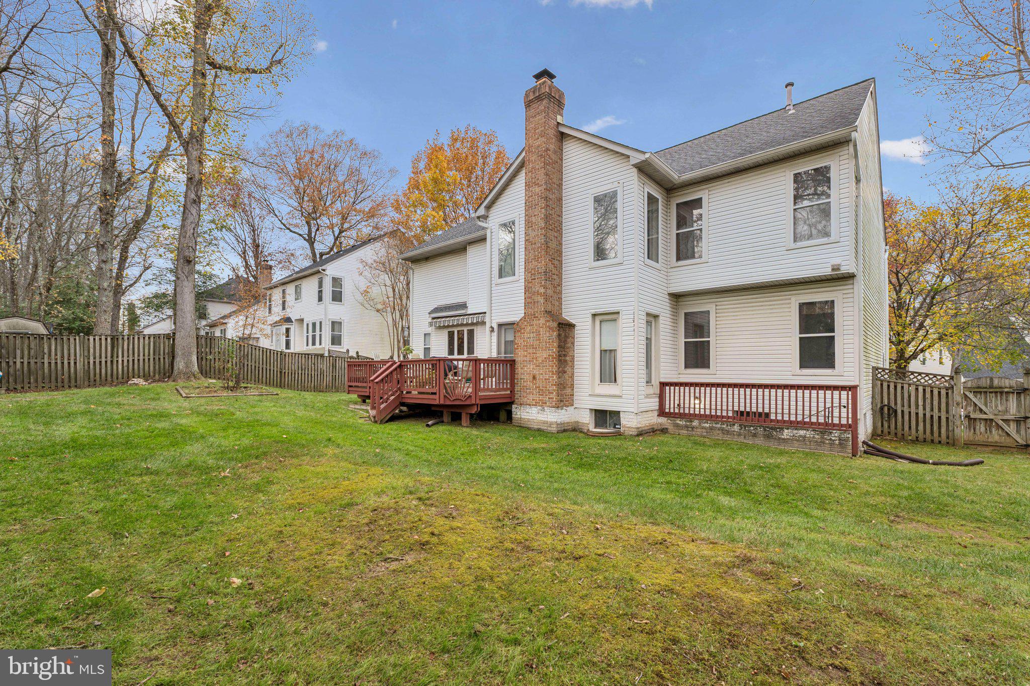 12205 Quick Fox Lane Bowie, MD 20720 - Photo 35 of 39 a view of a house with a yard