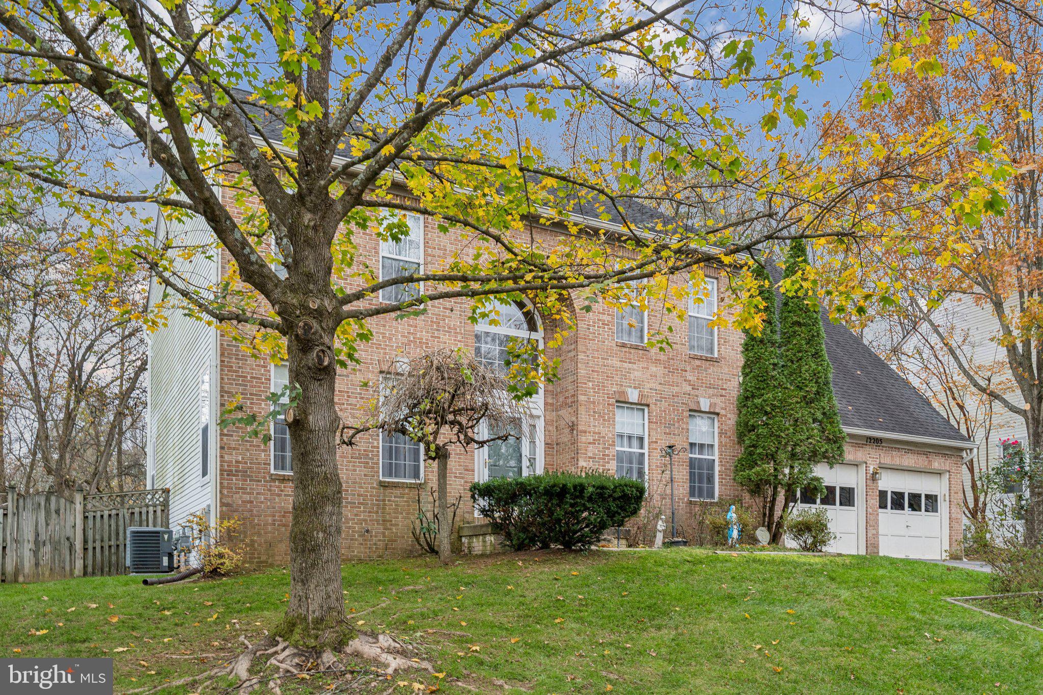 12205 Quick Fox Lane Bowie, MD 20720 - Photo 38 of 39 front view of house with a yard