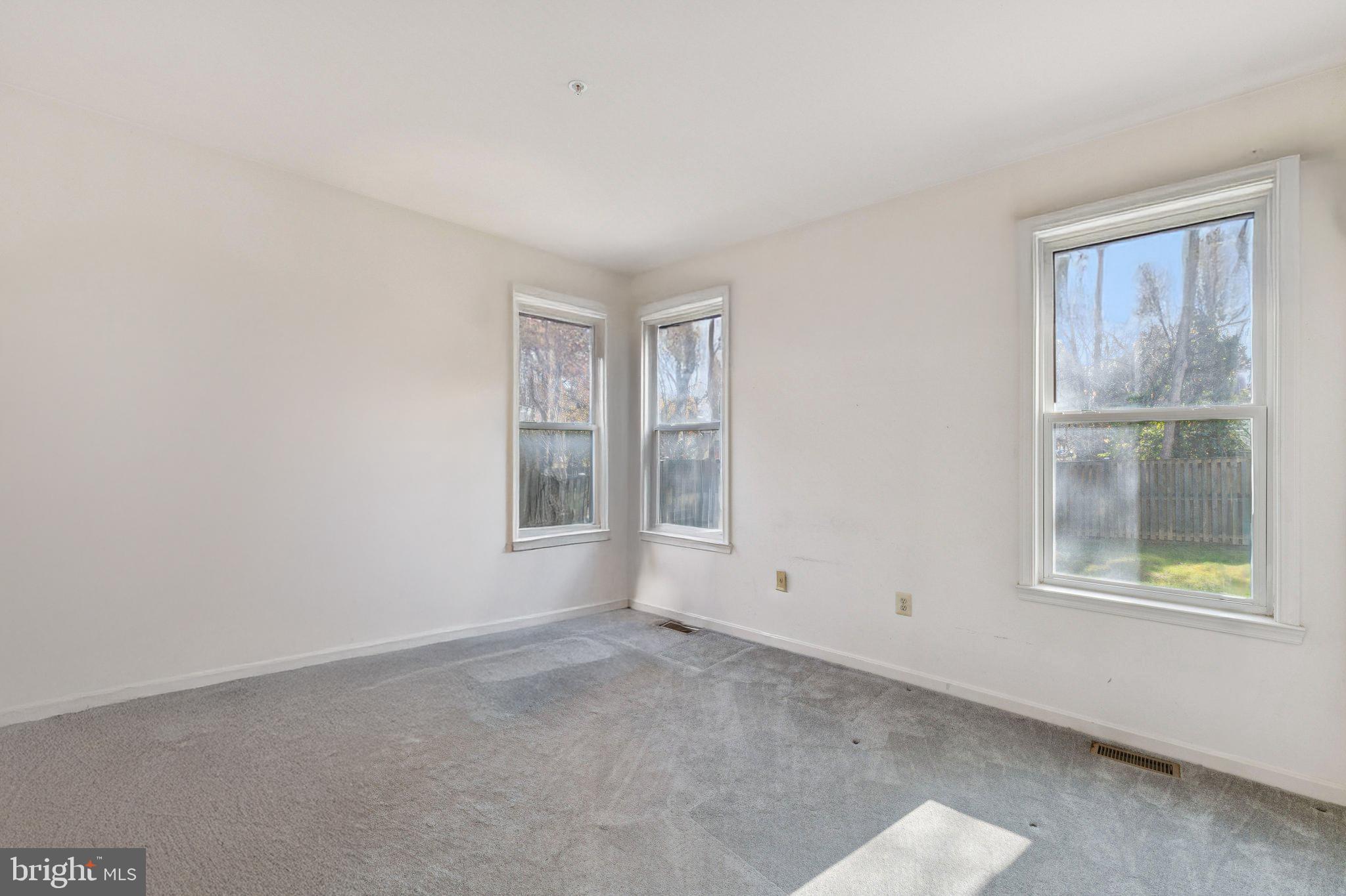 12205 Quick Fox Lane Bowie, MD 20720 - Photo 6 of 39 an empty room with windows