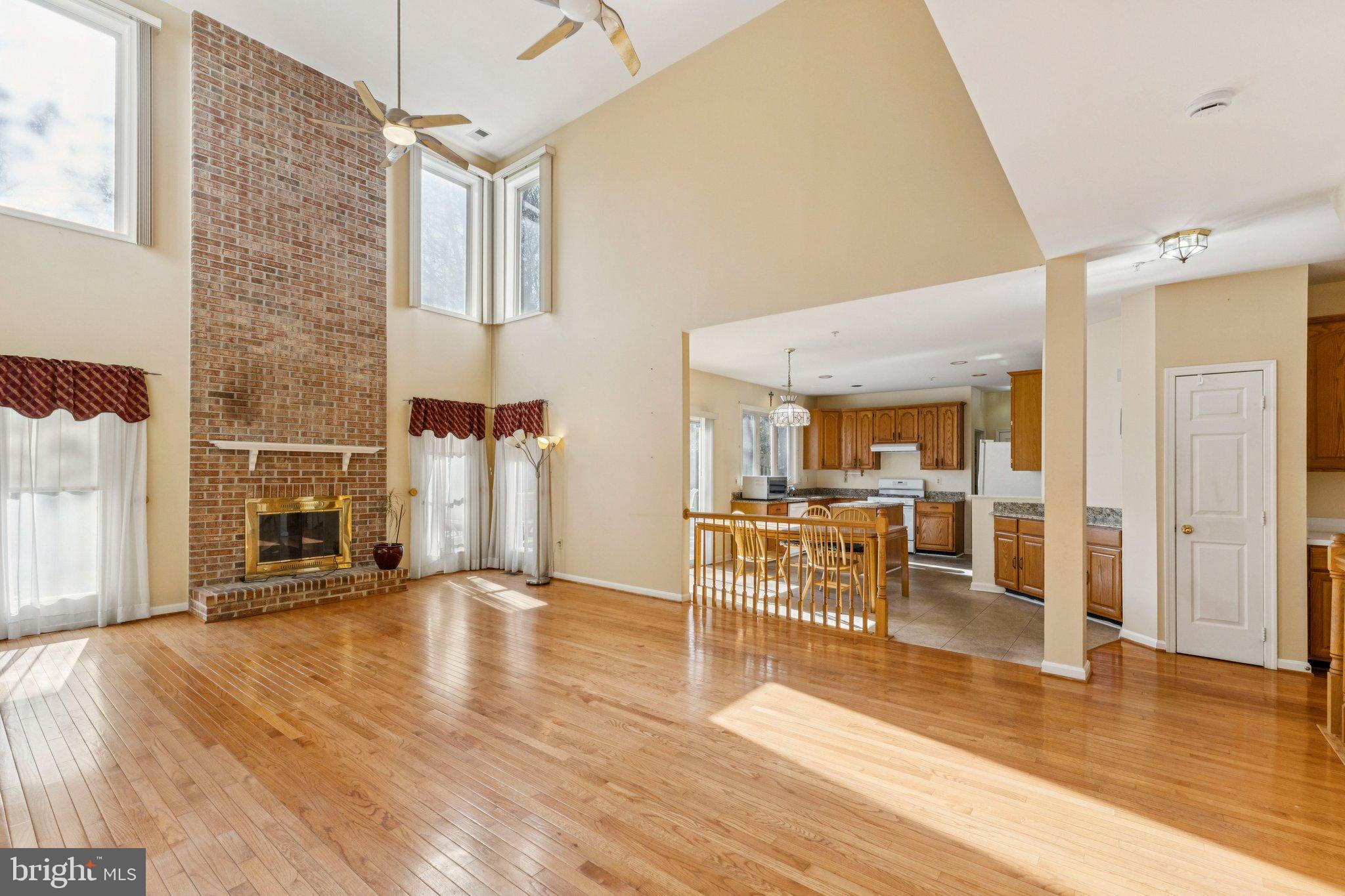 12205 Quick Fox Lane Bowie, MD 20720 - Photo 7 of 39 a view of a livingroom with wooden floor