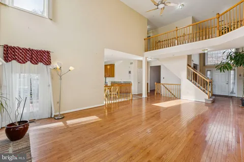 a view of a livingroom with wooden floor