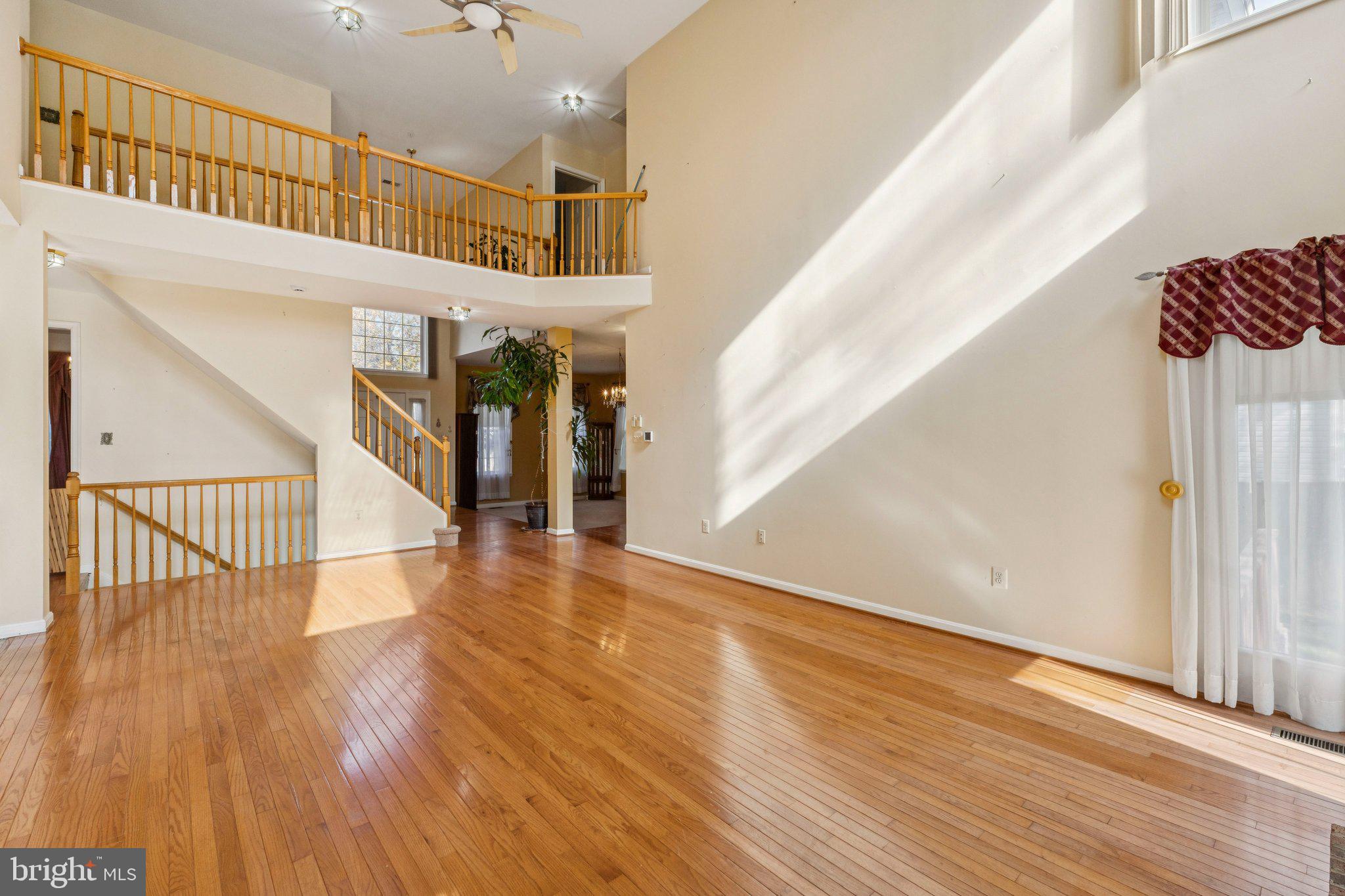 12205 Quick Fox Lane Bowie, MD 20720 - Photo 10 of 39 a view of an entryway with wooden floor