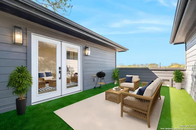 a view of front door and yard