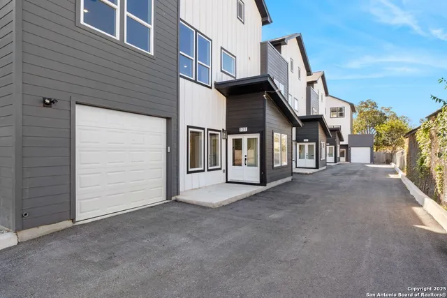 a view of a house with a garage