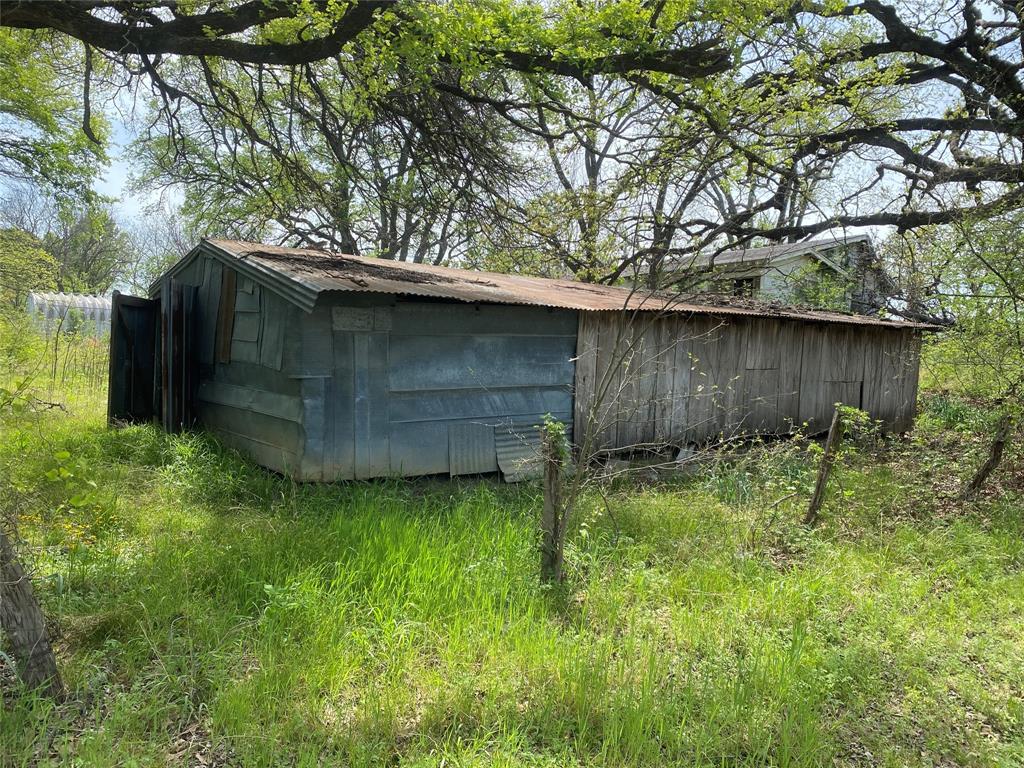 8929 West Fm 898 Ector, TX 75439 - Photo 4 of 12 a backyard of a house with lots of green space