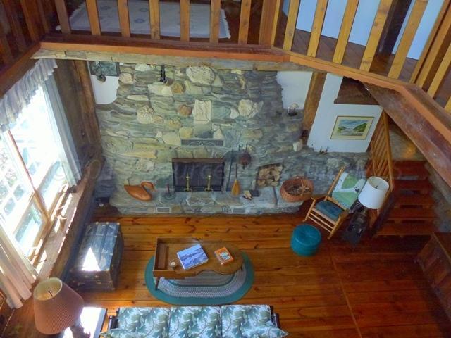 2993 Hancock Road Hancock, MA 01267 - Photo 18 of 32 a living room with furniture and a fireplace