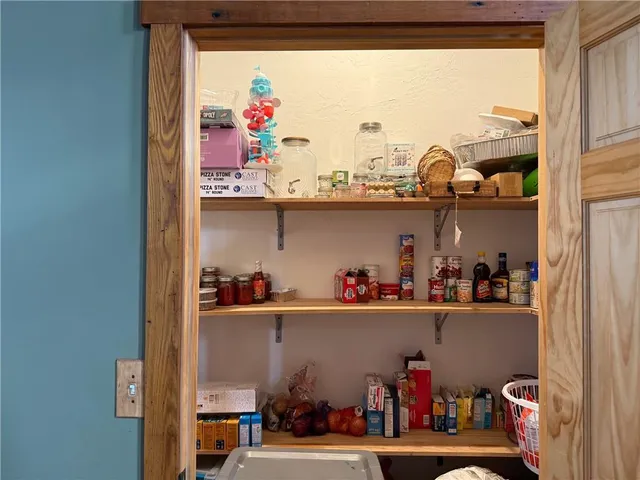 a view of storage and utility room