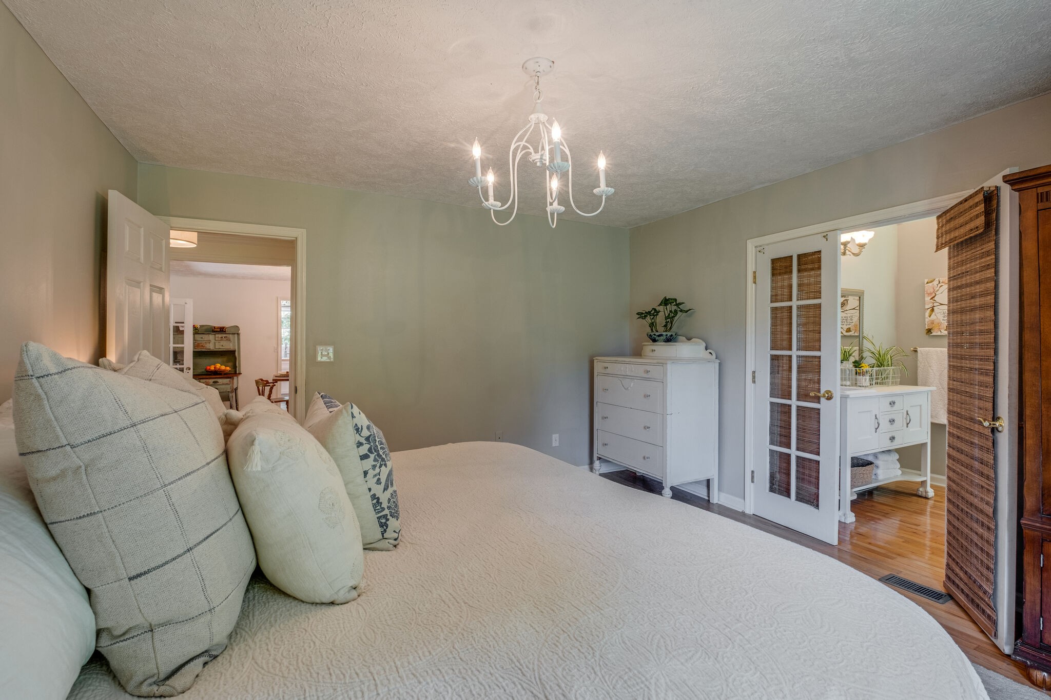 2540 Thompson Road Murfreesboro, TN 37128 - Photo 20 of 48 a bedroom with a bed and a chandelier