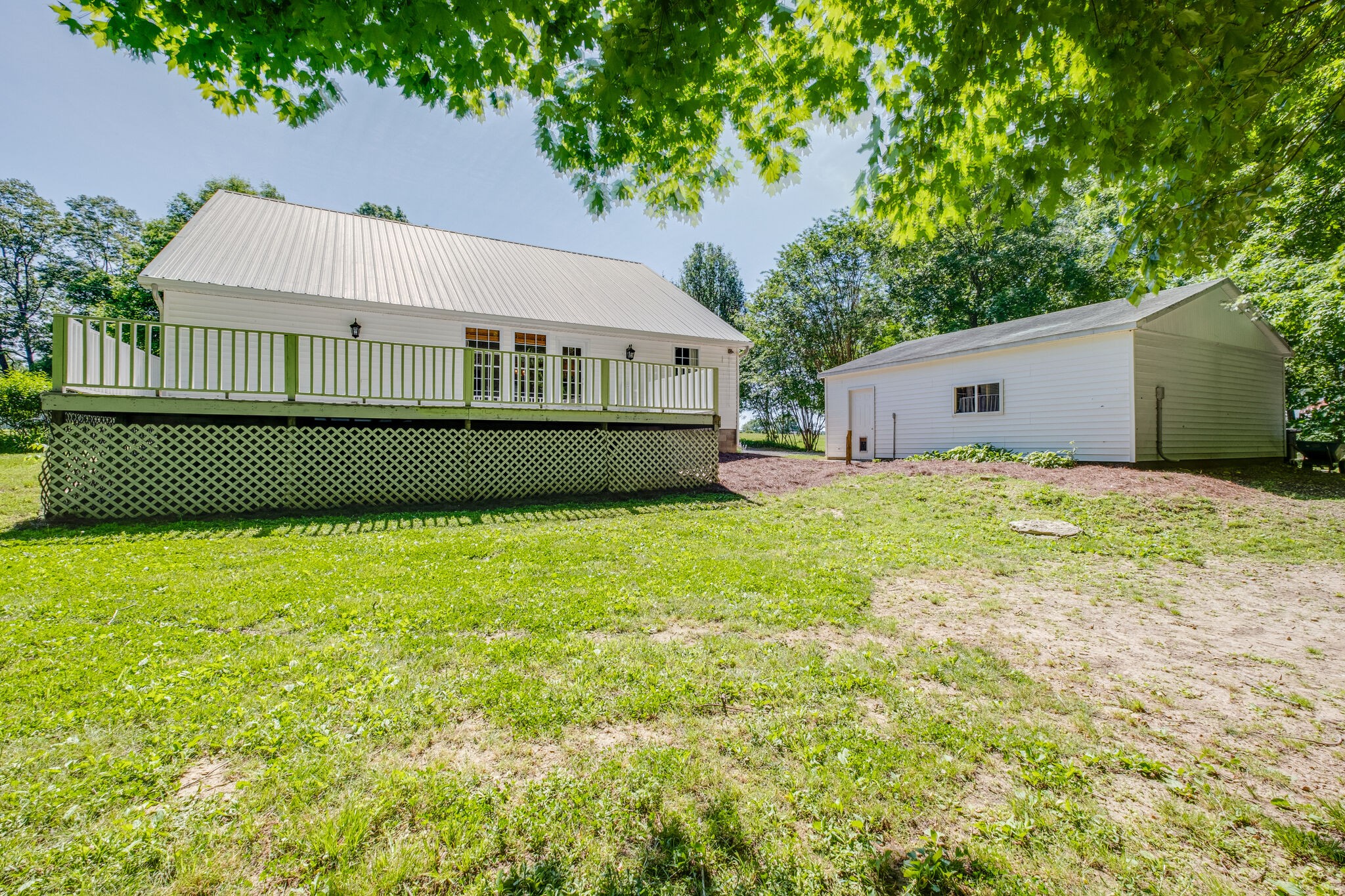 2540 Thompson Road Murfreesboro, TN 37128 - Photo 26 of 48 a front view of a house with a garden