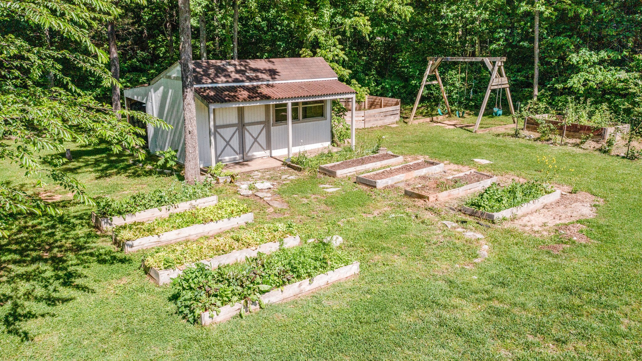 2540 Thompson Road Murfreesboro, TN 37128 - Photo 29 of 48 a backyard of a house with yard and outdoor seating