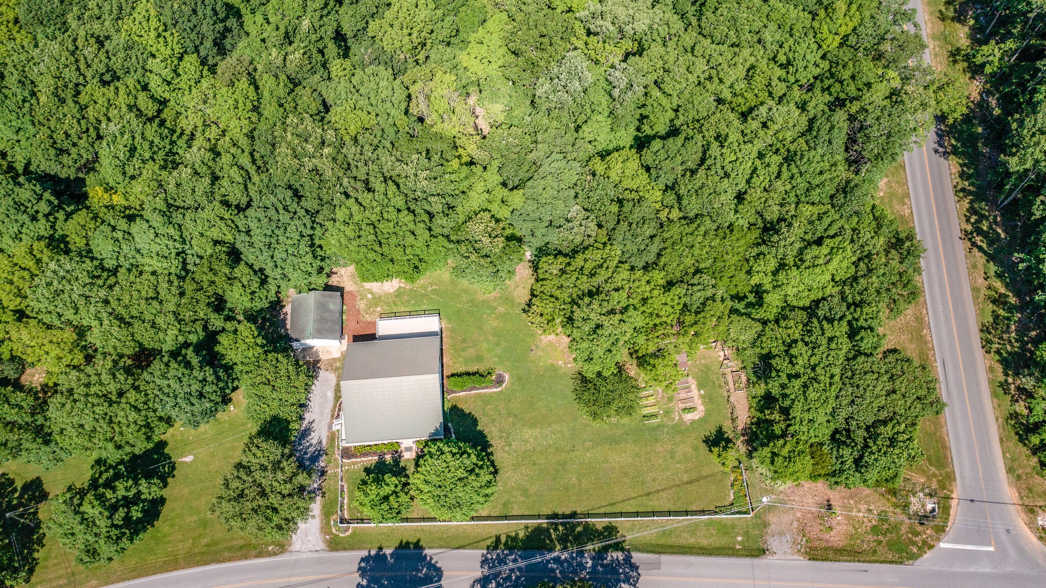 2540 Thompson Road Murfreesboro, TN 37128 - Photo 48 of 48 an aerial view of a house with a yard