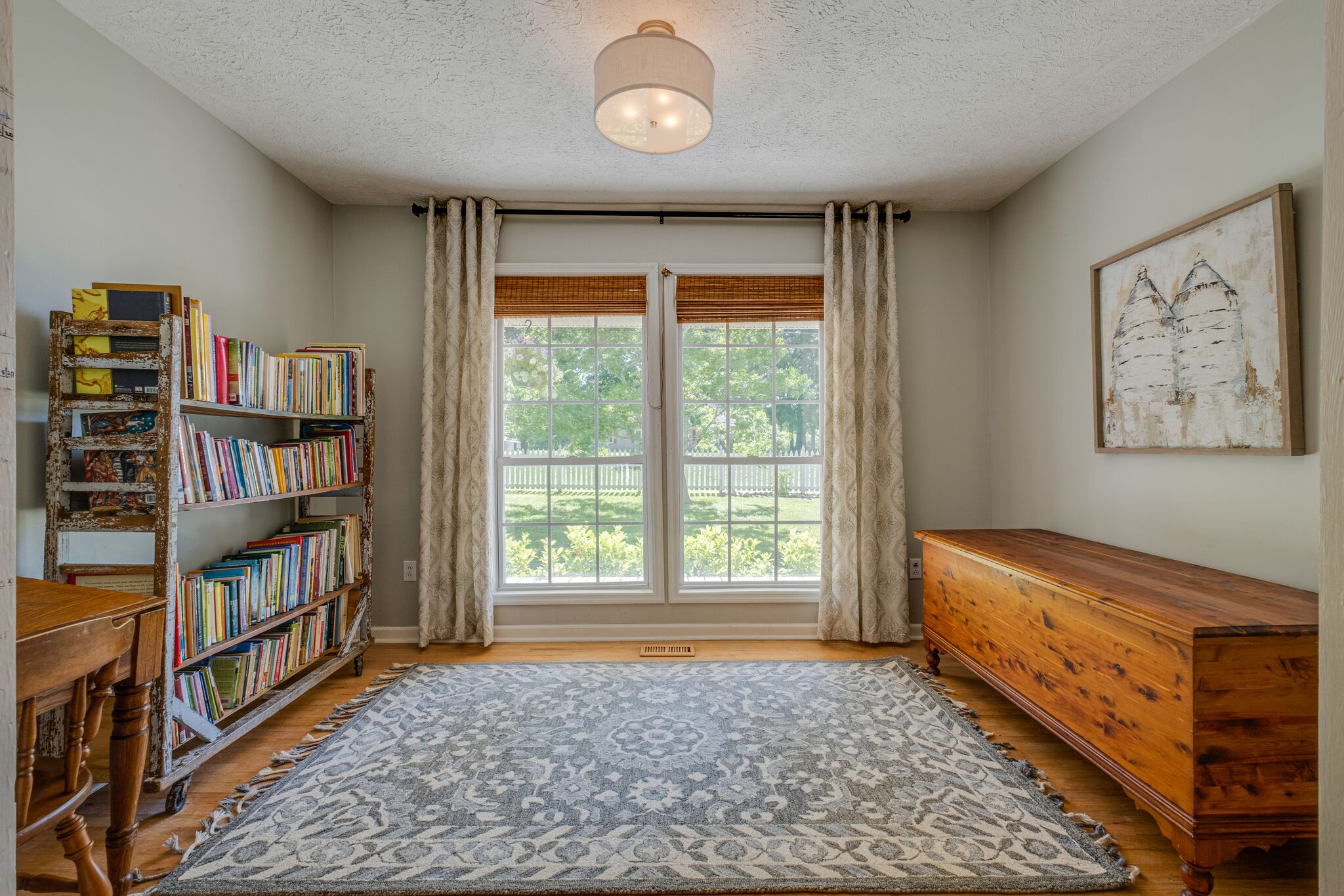 2540 Thompson Road Murfreesboro, TN 37128 - Photo 9 of 48 a living room with furniture and a book shelf