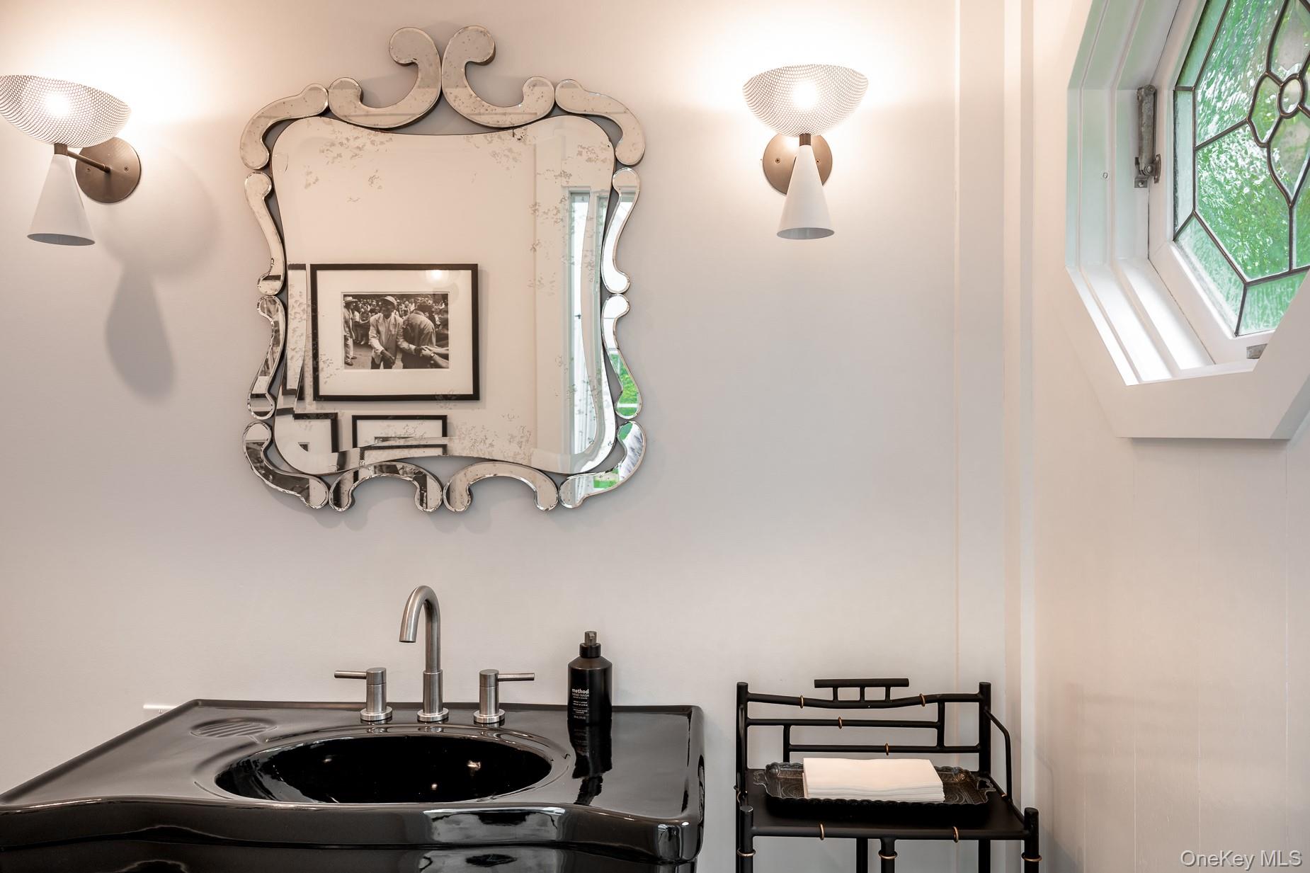 149 Washington Springs Road Palisades, NY 10964 - Photo 11 of 31 a bathroom with a sink and a mirror