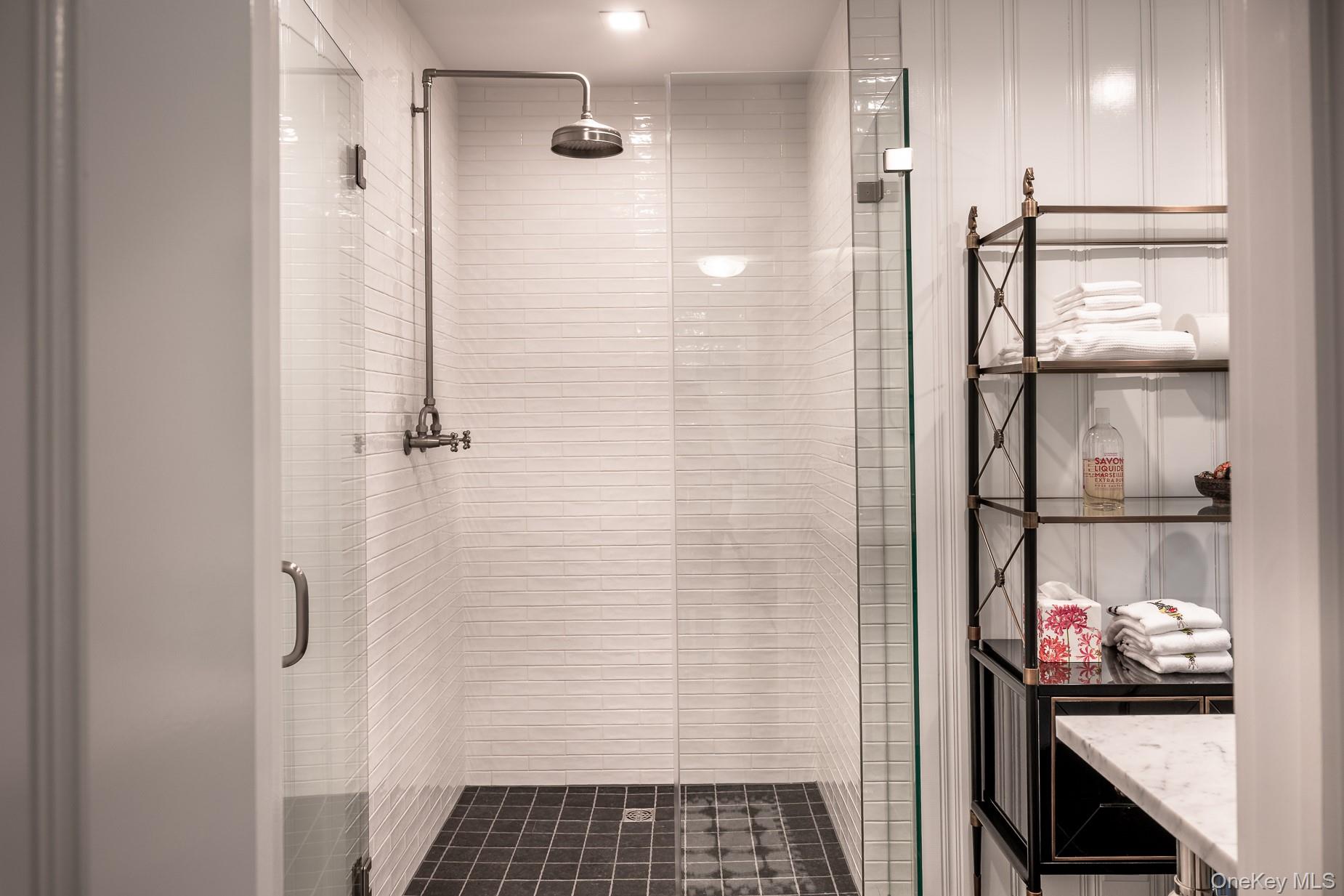 149 Washington Springs Road Palisades, NY 10964 - Photo 15 of 31 a bathroom with a glass shower door