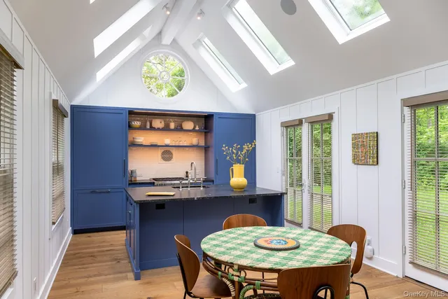 a dining room with furniture and window