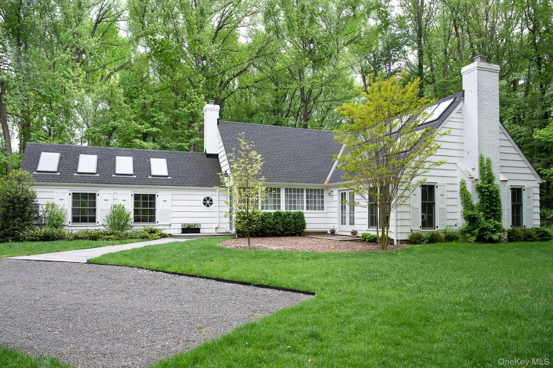 149 Washington Springs Road Palisades, NY 10964 - Photo 30 of 31 a front view of a house with a yard and trees