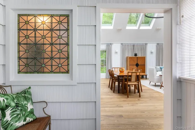 a view of a dining room with furniture window and outside view