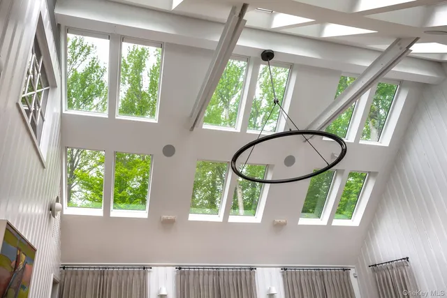 a view of a balcony with wooden floor