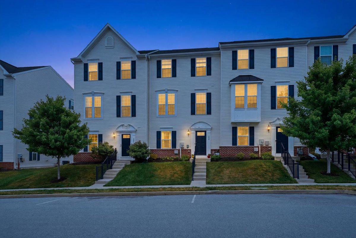 Charming townhome at twilight glow.