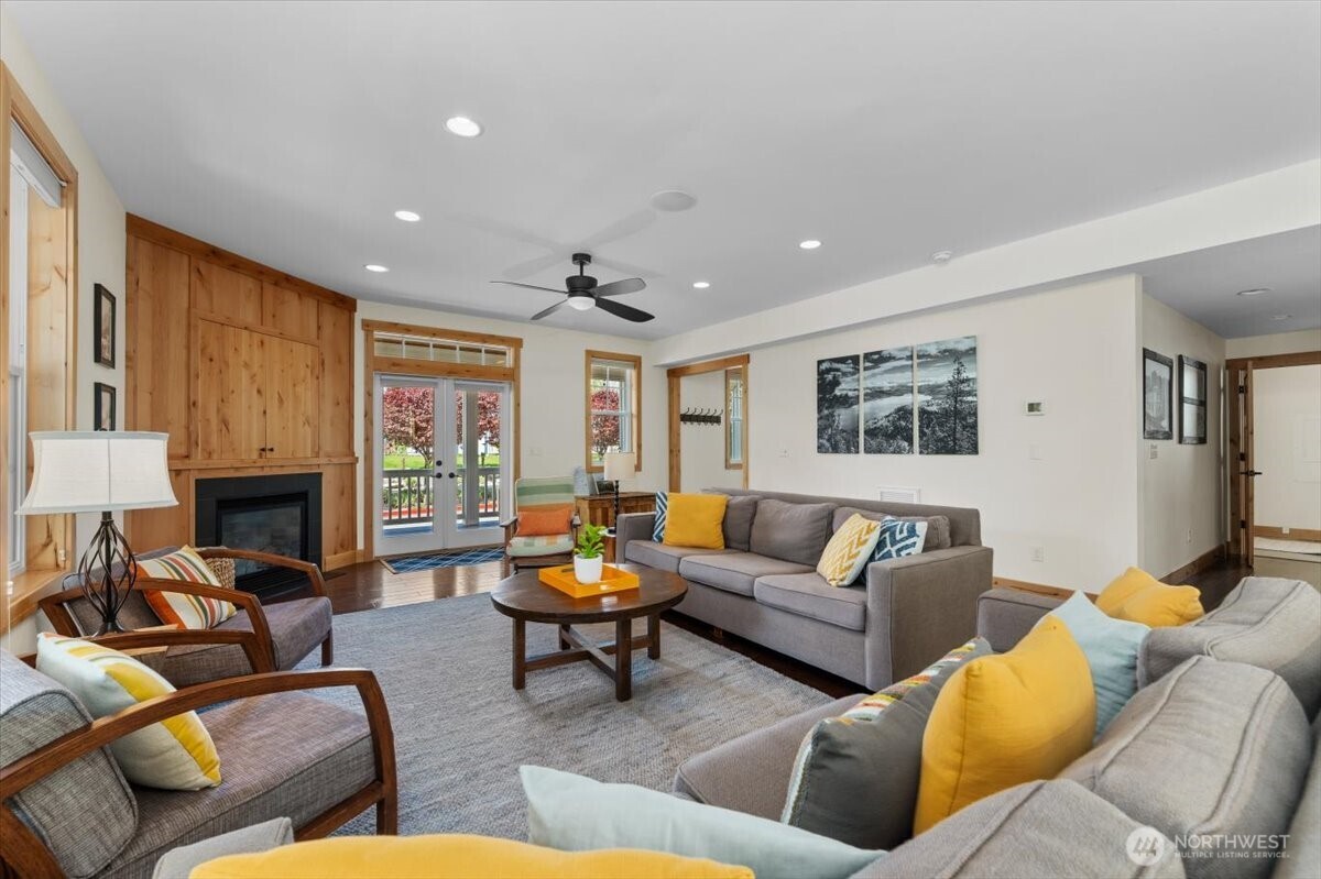 108 Jackrabbit Lane Chelan, WA 98816 - Photo 12 of 40 a living room with furniture and a fireplace