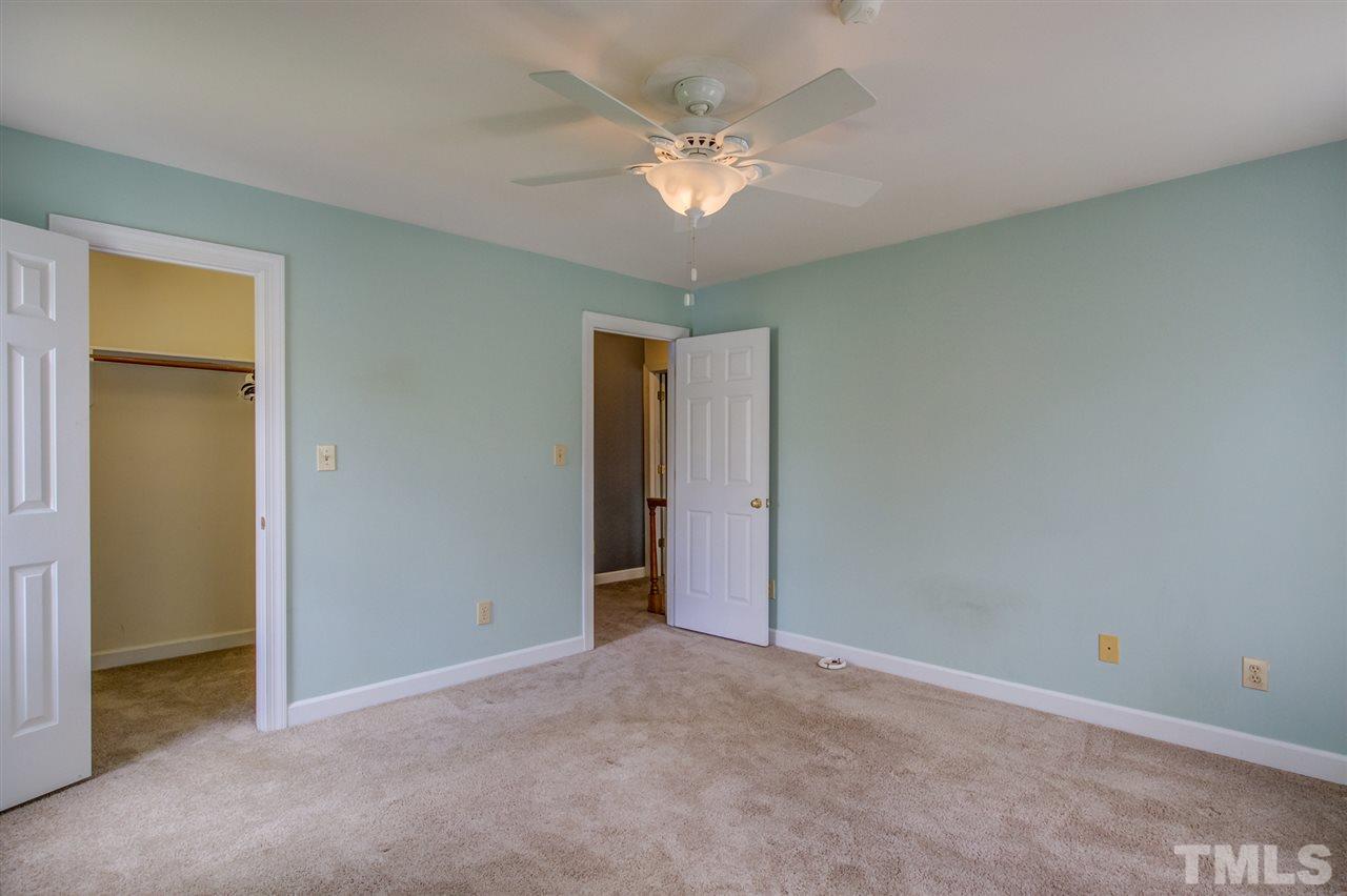 6908 Spring Drive Raleigh, NC 27613 - Photo 22 of 30 a view of an empty room with a window