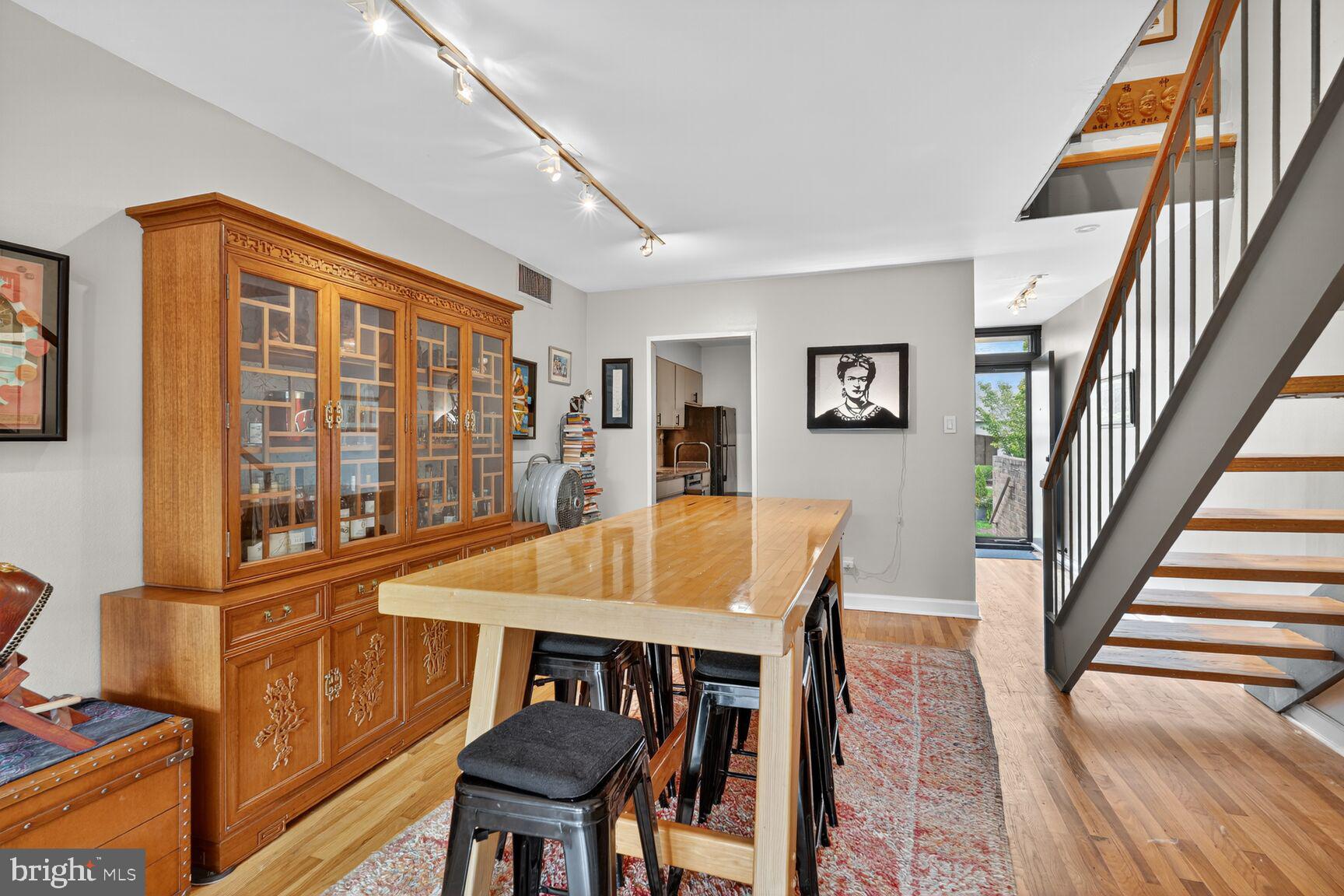 333 N Street Southwest, Unit 333 Washington, DC 20024 - Photo 6 of 20 a view of a dining room with furniture window and wooden floor