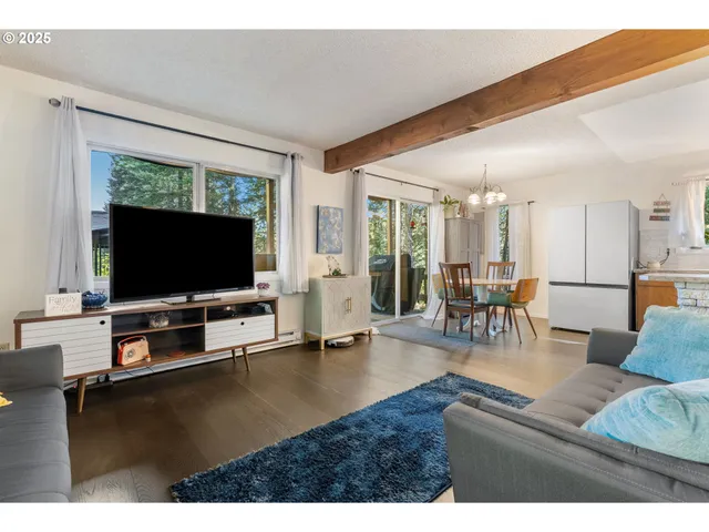 a kitchen with a stove a sink and a microwave