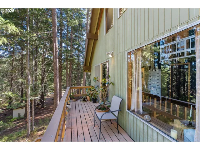 a view of balcony with wooden floor
