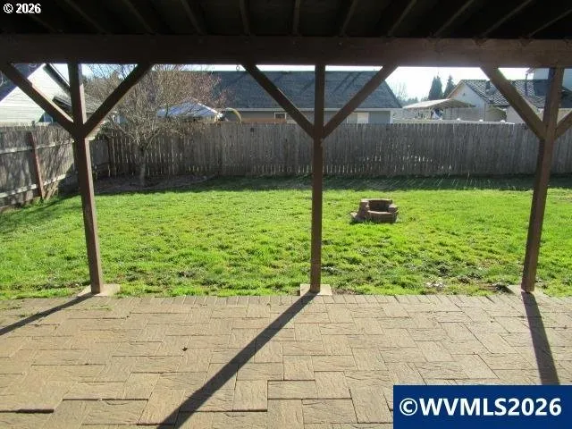 a view of a back yard of the house