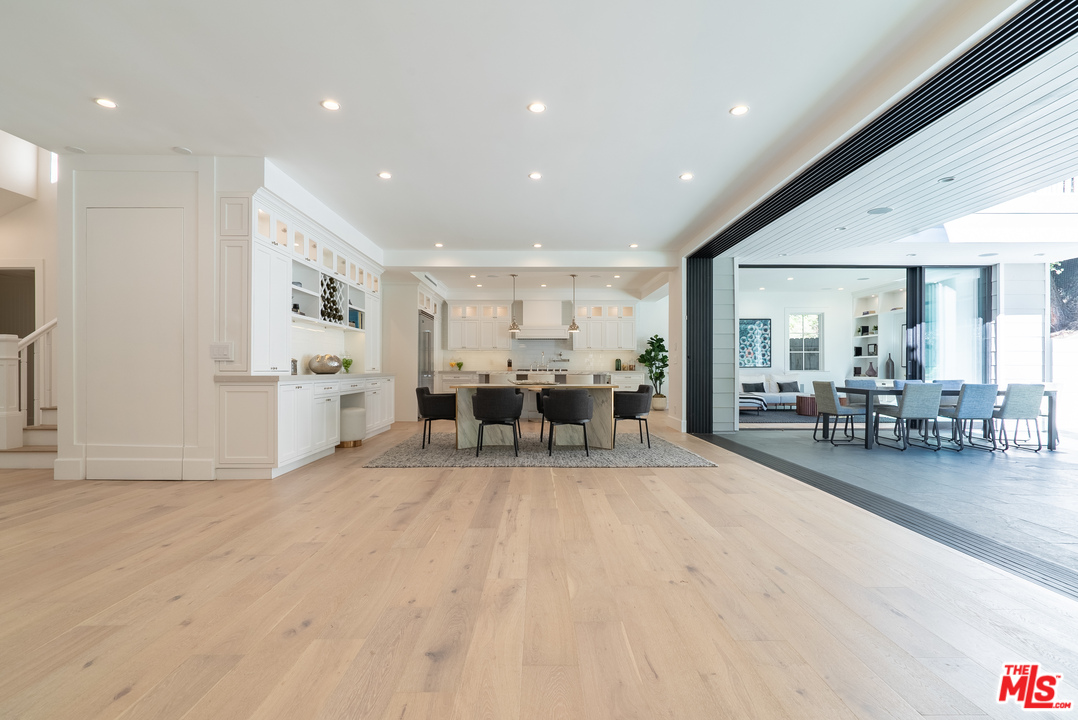 2794 Mandeville Canyon Road Los Angeles, CA 90049 - Photo 6 of 18 a living room with furniture and wooden floor