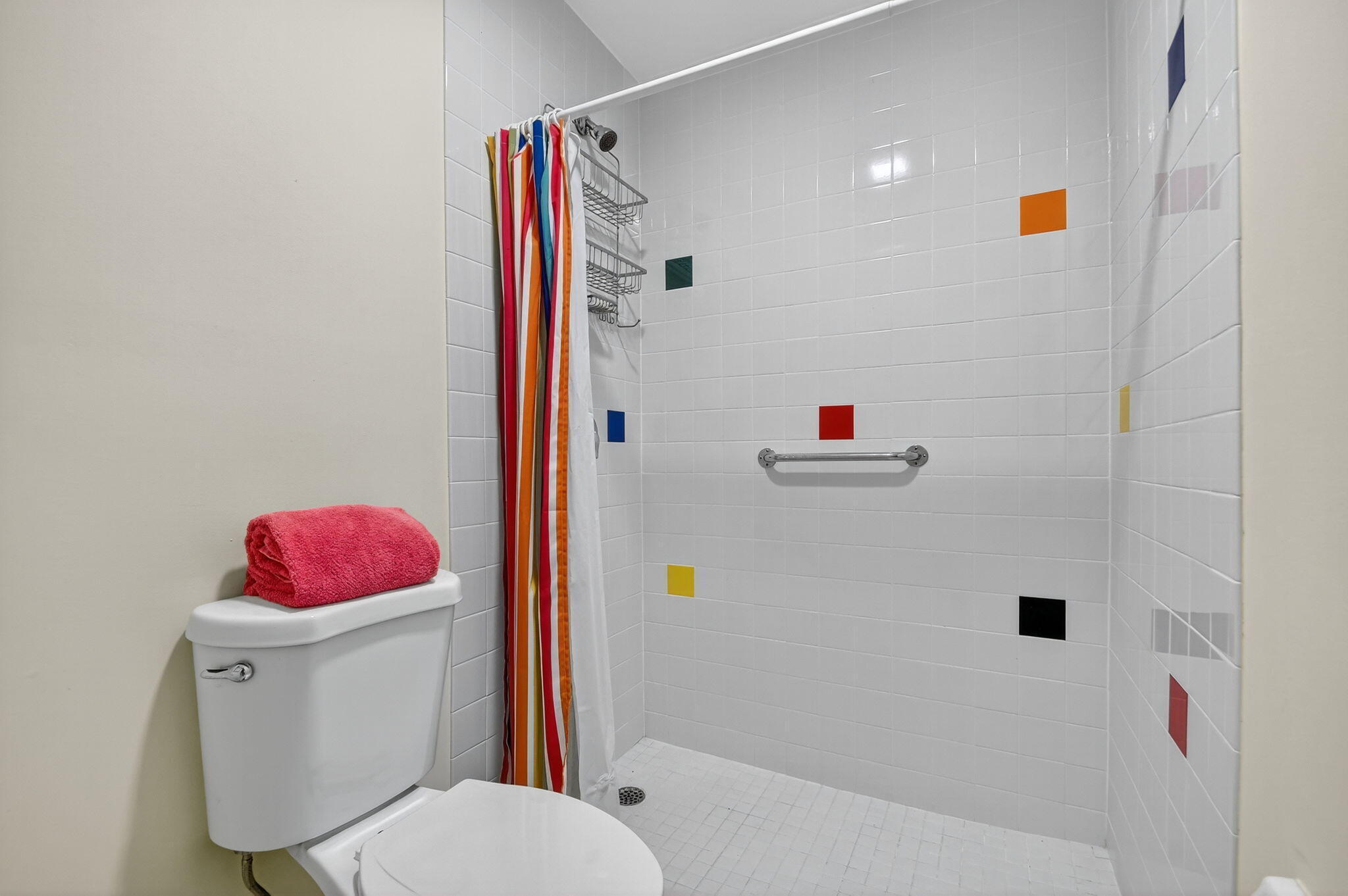 324 Orange Tree Drive, Unit 5 Atlantis, FL 33462 - Photo 17 of 29 a bathroom with a sink toilet and shower