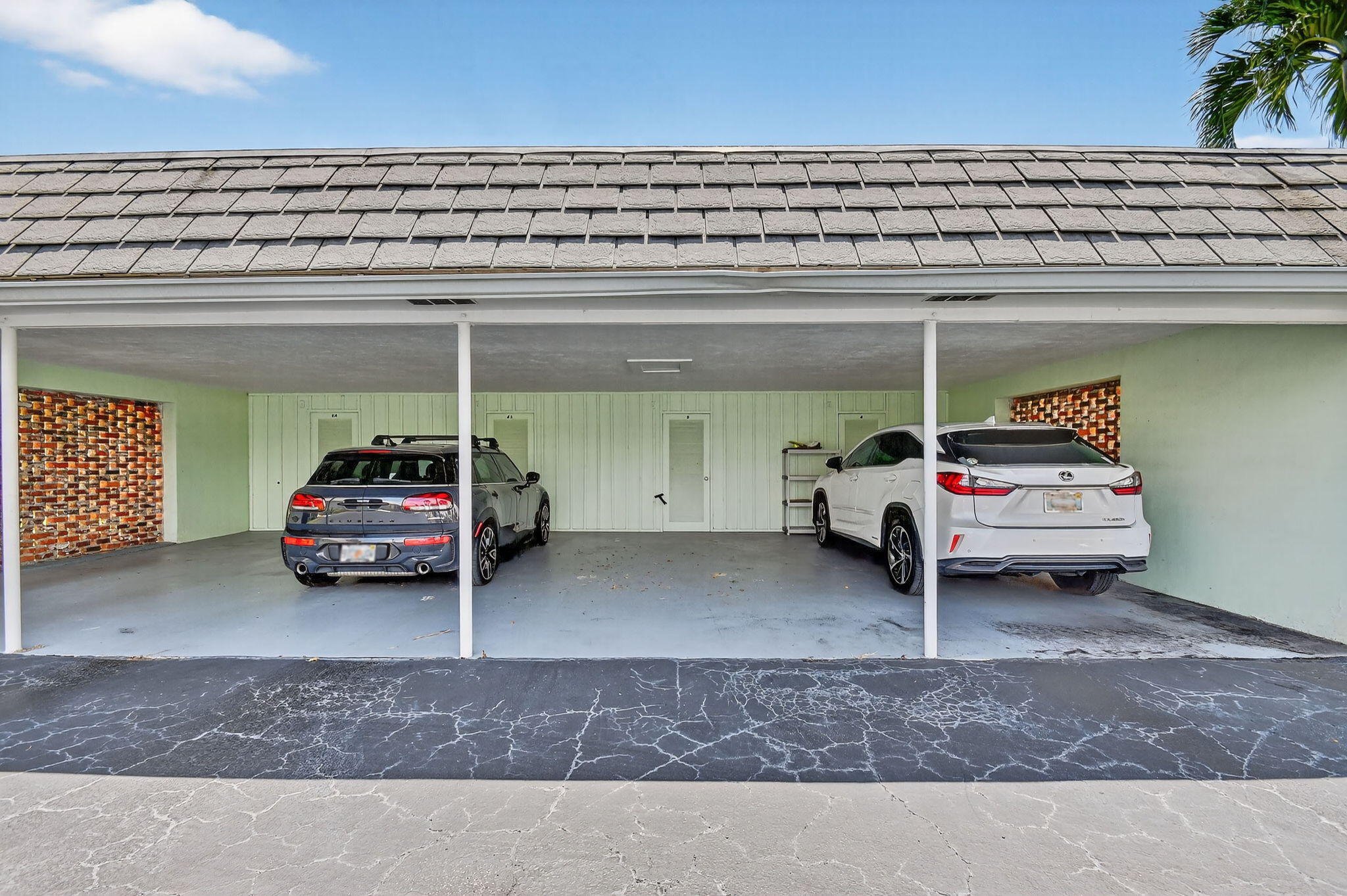 324 Orange Tree Drive, Unit 5 Atlantis, FL 33462 - Photo 20 of 29 a view of car parking