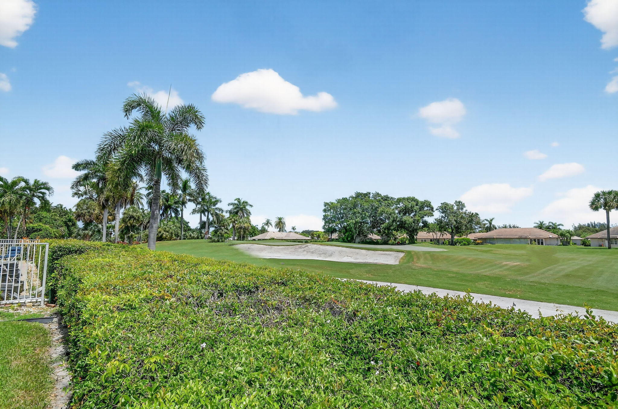 324 Orange Tree Drive, Unit 5 Atlantis, FL 33462 - Photo 22 of 29 a view of a golf course