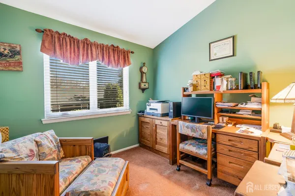 a room with furniture and a window