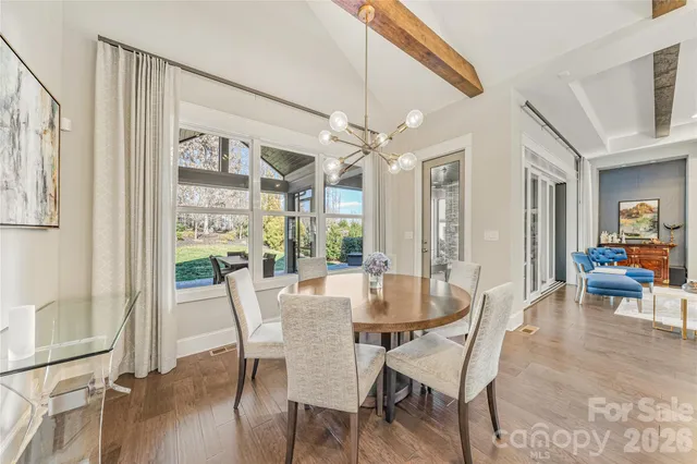a kitchen with refrigerator and cabinets