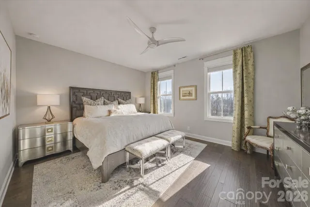 a living room with furniture a pool table and a flat screen tv