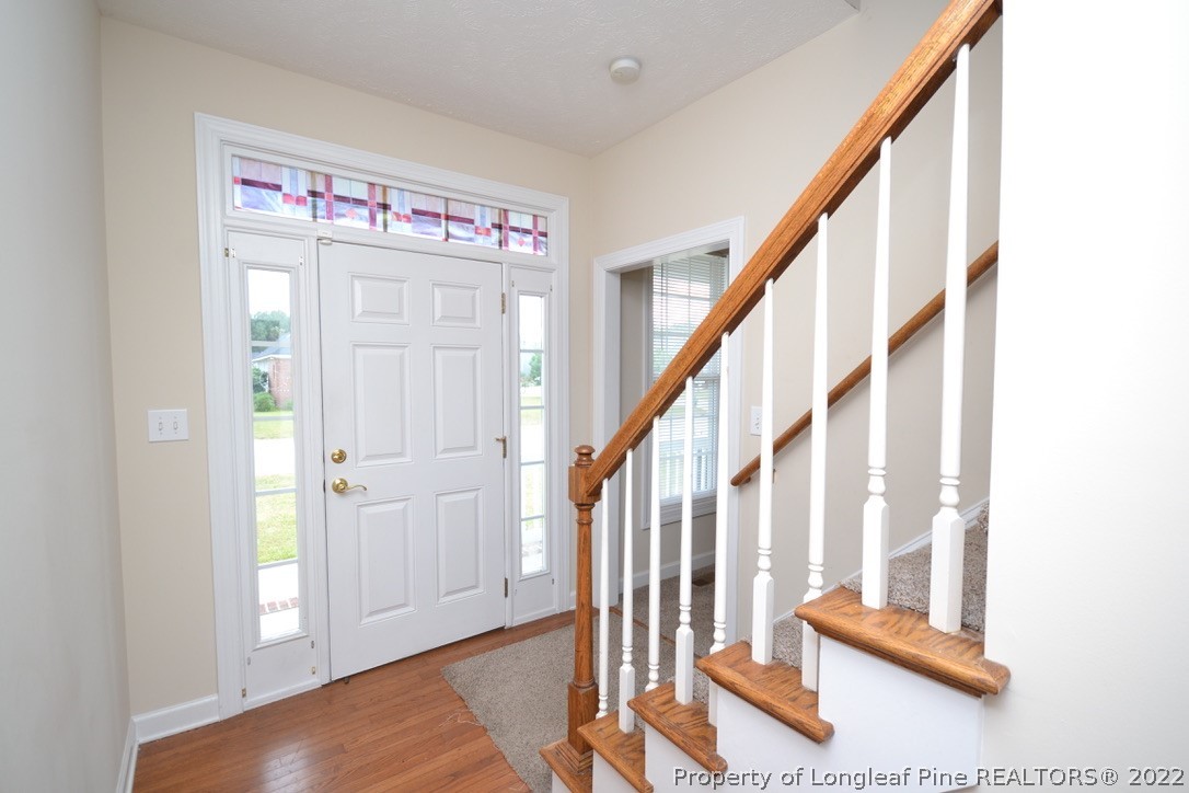 3608 Talus Road Fayetteville, NC 28306 - Photo 2 of 46 a view of an entryway with staircase