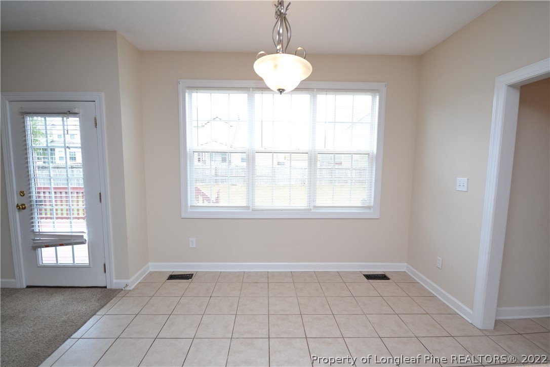3608 Talus Road Fayetteville, NC 28306 - Photo 21 of 46 a view of an empty room with a window