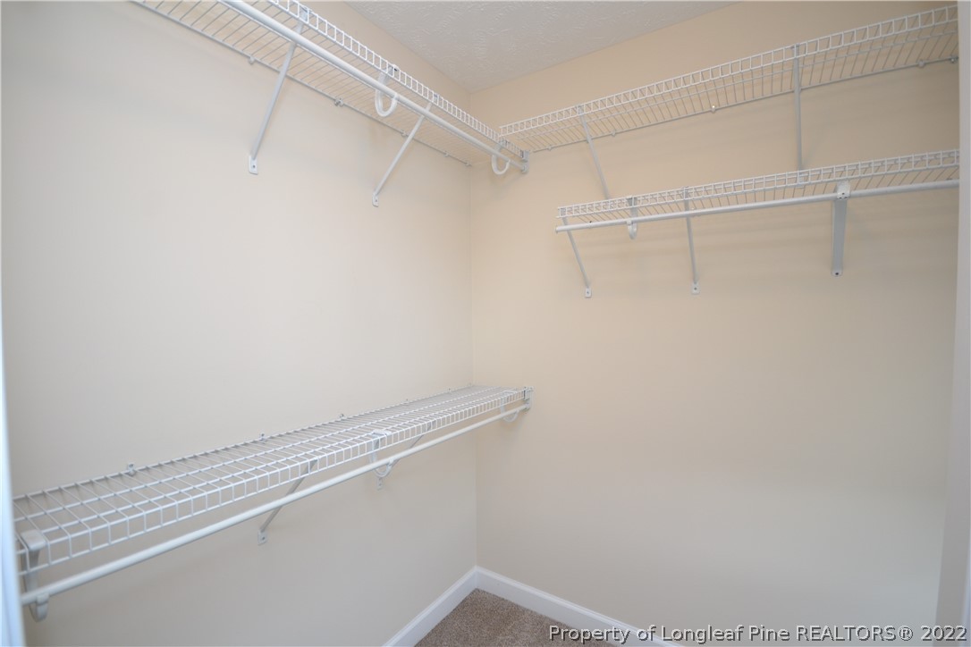 3608 Talus Road Fayetteville, NC 28306 - Photo 29 of 46 a view of a room with racks on the wall